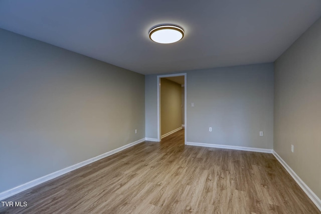 unfurnished room featuring light hardwood / wood-style flooring