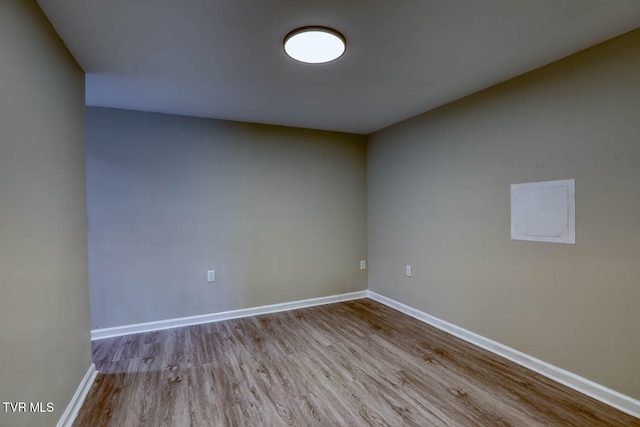 spare room with light wood-type flooring