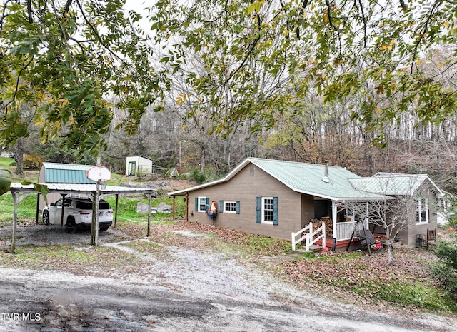 view of front of property with a carport