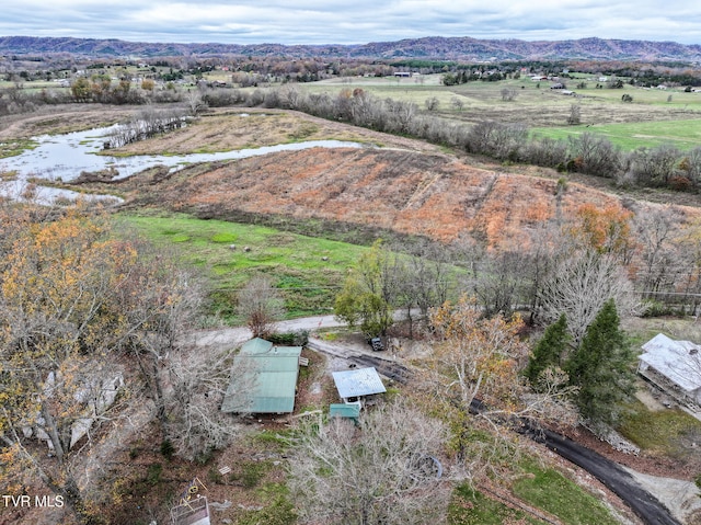 aerial view featuring a mountain view and a rural view