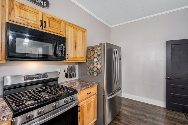 kitchen featuring dark wood-type flooring, crown molding, dark stone countertops, light brown cabinetry, and stainless steel appliances