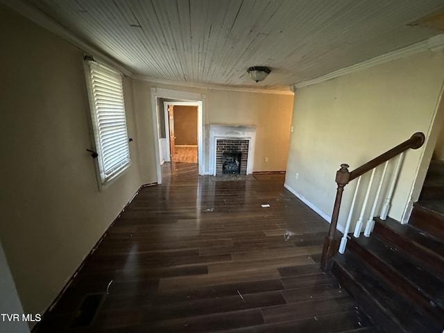 corridor with ornamental molding and dark wood-type flooring