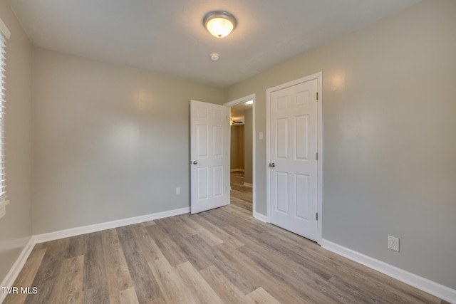 unfurnished bedroom with light hardwood / wood-style floors