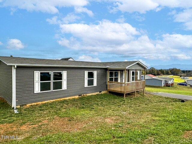 307 Bungalow Dr, Dandridge, TN 37725 - back of house with a wooden deck and a yard
