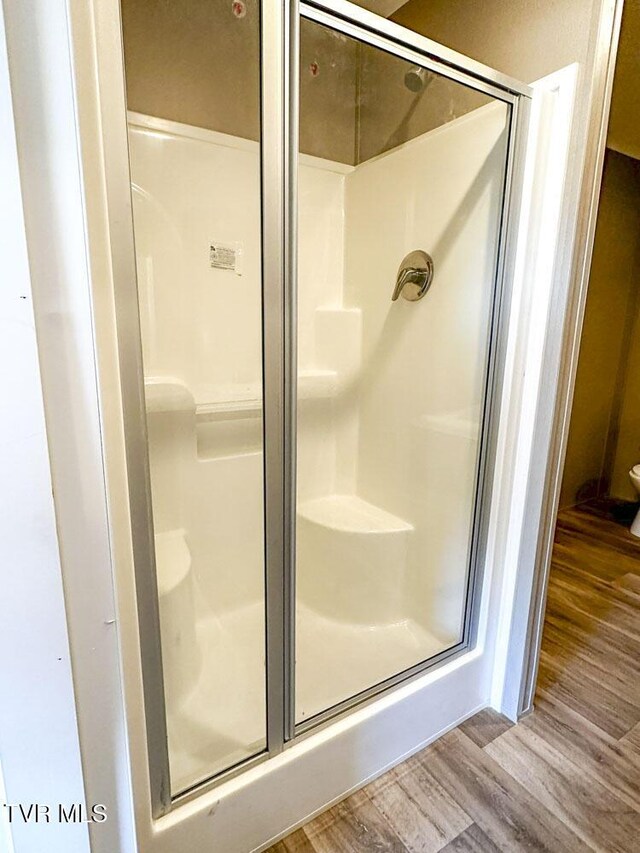 307 Bungalow Dr, Dandridge, TN 37725 - bathroom with hardwood / wood-style floors and walk in shower