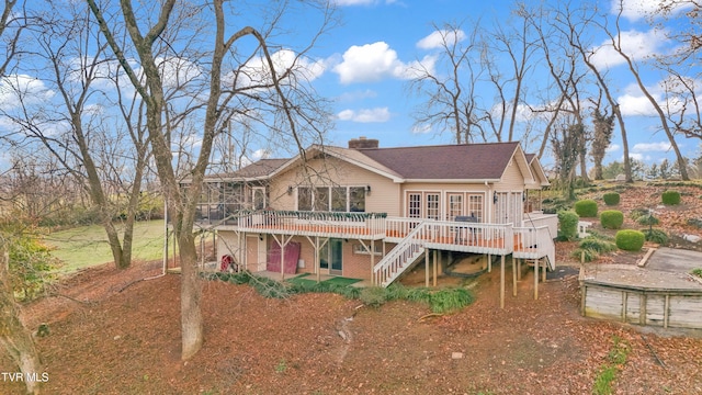 rear view of property with a deck