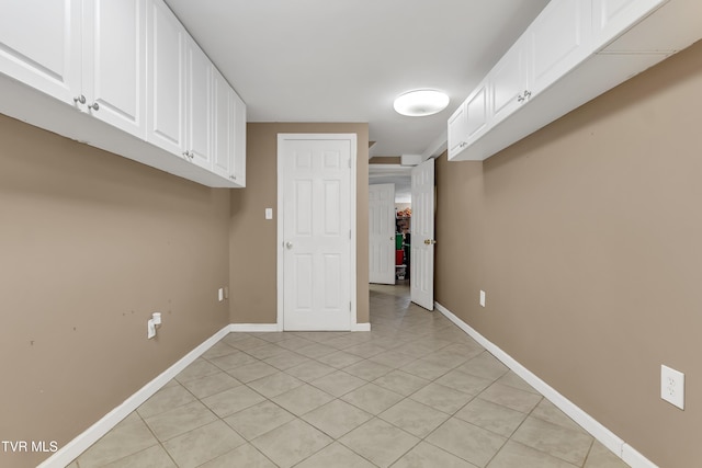 washroom featuring light tile patterned floors