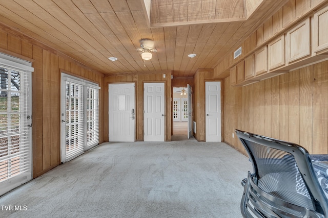 interior space featuring wooden ceiling