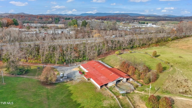 bird's eye view with a mountain view and a rural view