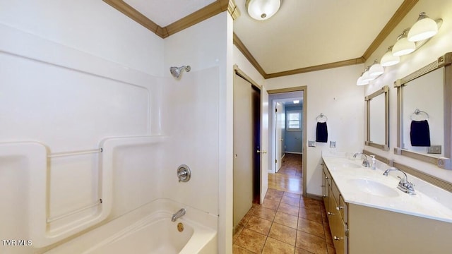 bathroom with shower / tub combination, vanity, tile patterned floors, and ornamental molding