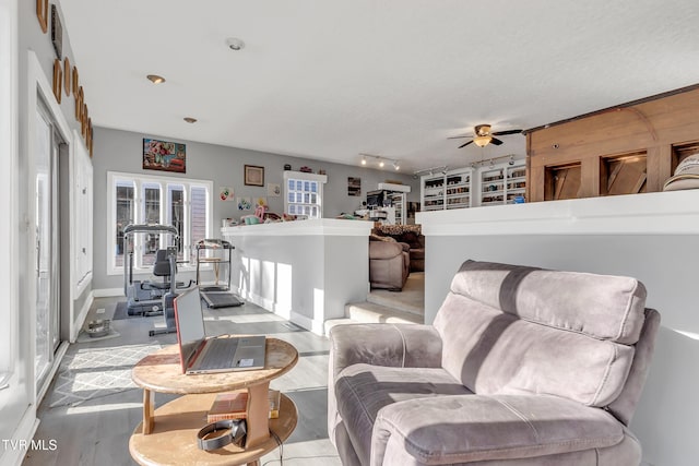 106 W Sycamore Ave, Big Stone Gap, VA 24219 - living area with wood finished floors and a ceiling fan