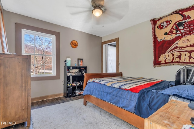 106 W Sycamore Ave, Big Stone Gap, VA 24219 - bedroom featuring wood finished floors, baseboards, and a ceiling fan