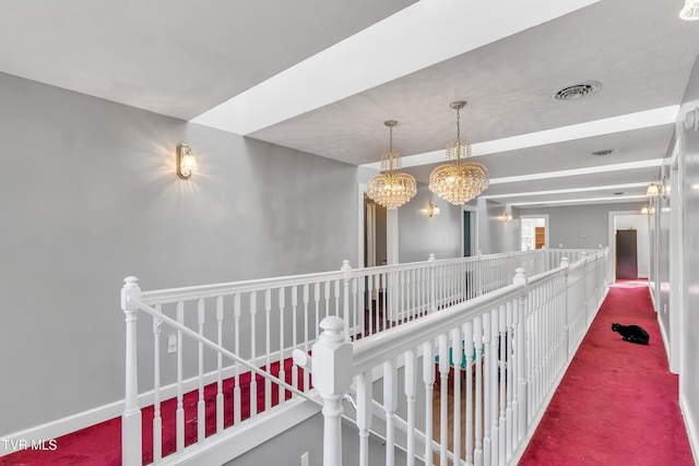 106 W Sycamore Ave, Big Stone Gap, VA 24219 - hall featuring carpet, an upstairs landing, and a chandelier