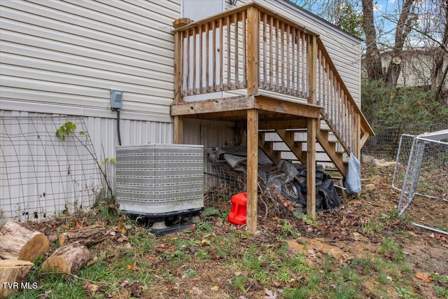 wooden deck with central AC unit