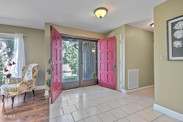 entrance foyer with light wood-type flooring