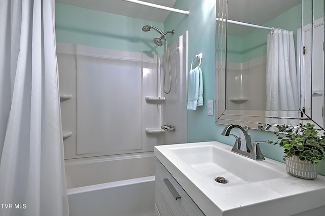 bathroom featuring vanity and shower / bath combo