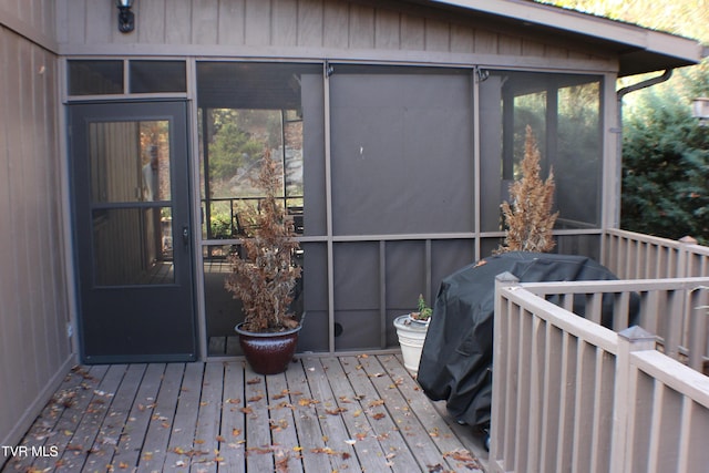 entrance to property with a deck