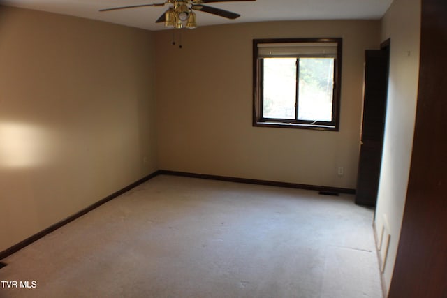 unfurnished room featuring ceiling fan