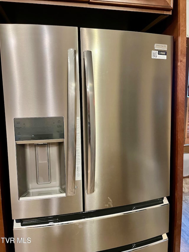 interior details with stainless steel refrigerator with ice dispenser