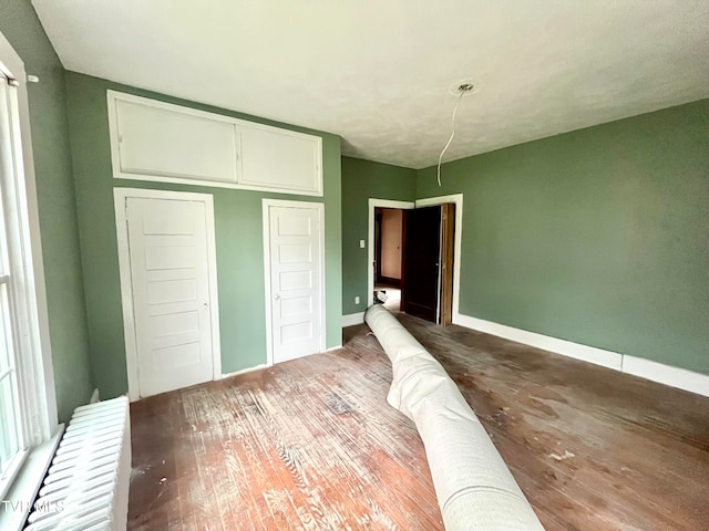 unfurnished bedroom with a closet