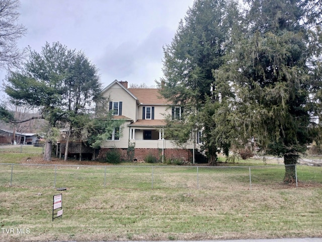 view of front facade with a front lawn