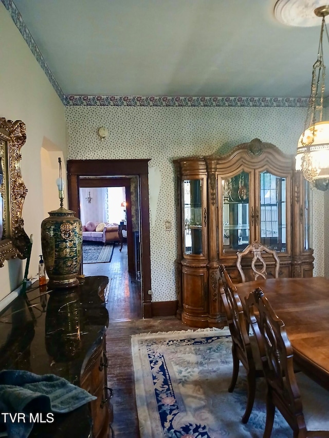 dining room featuring dark hardwood / wood-style flooring