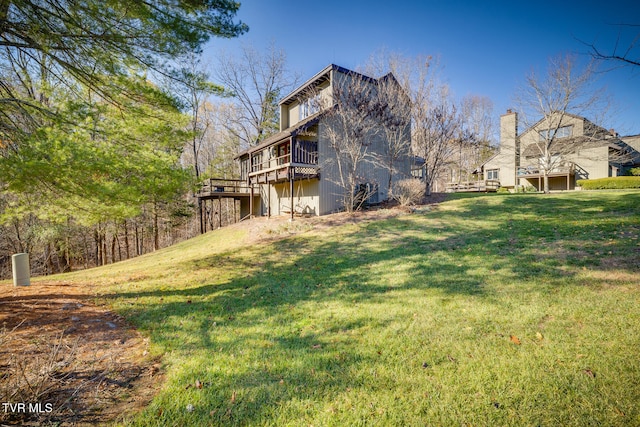 view of yard featuring a wooden deck