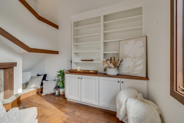 sitting room with hardwood / wood-style flooring