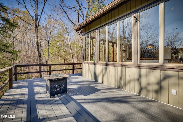 deck with a fire pit