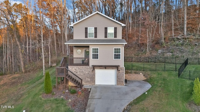 front facade with a garage and a front lawn