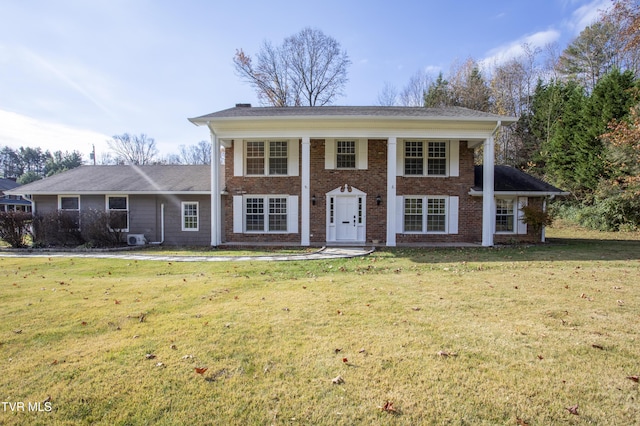 view of front of property with a front lawn