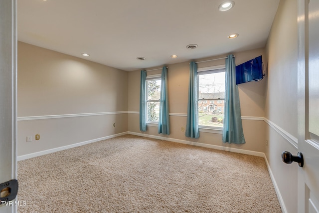 view of carpeted spare room