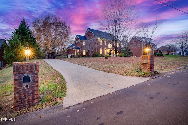 view of property exterior at dusk