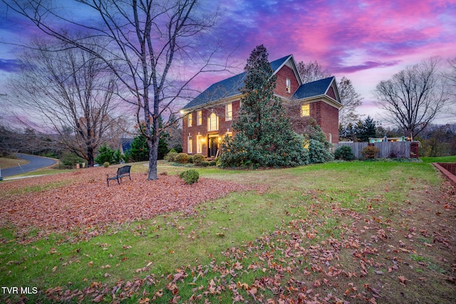 view of front of house with a lawn