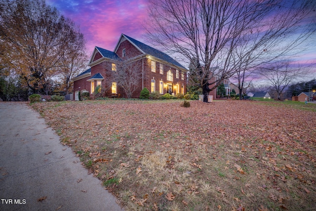 view of property exterior at dusk