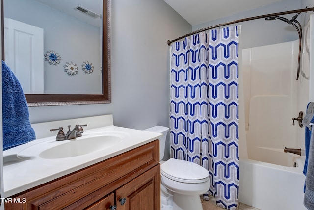 full bathroom with shower / tub combo, vanity, and toilet