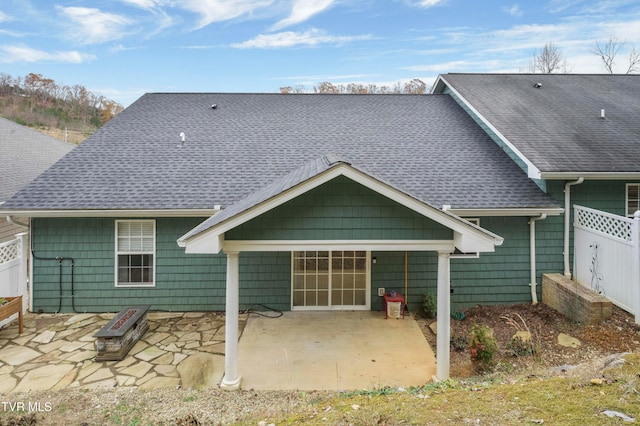 back of property with a patio area