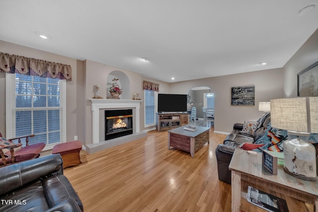 living room with light hardwood / wood-style floors