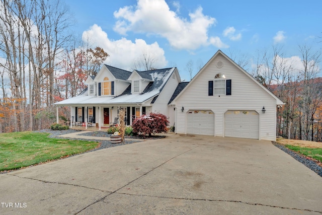 cape cod-style house featuring a garage, covered porch, and a front lawn