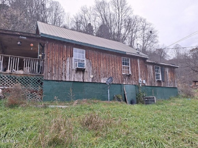 view of home's exterior featuring cooling unit