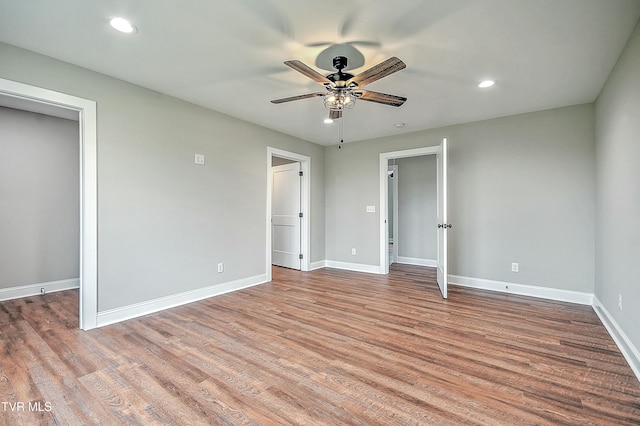 unfurnished bedroom featuring light hardwood / wood-style floors and ceiling fan