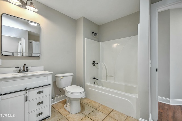 full bathroom featuring vanity, toilet, bathing tub / shower combination, and tile patterned flooring