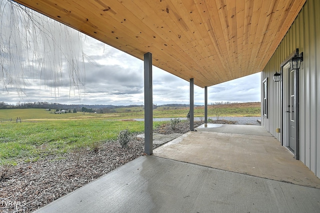 view of patio with a rural view