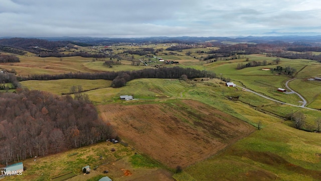 birds eye view of property featuring a rural view