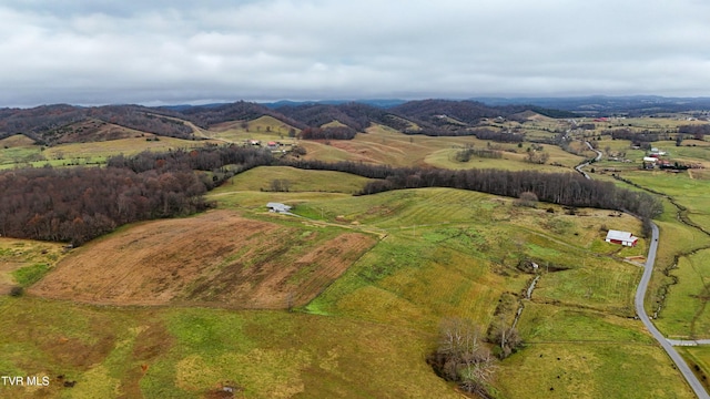 aerial view with a mountain view and a rural view