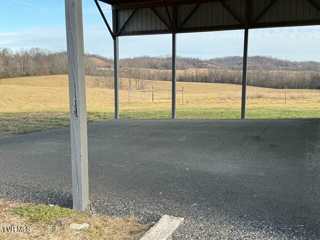 exterior space featuring a rural view