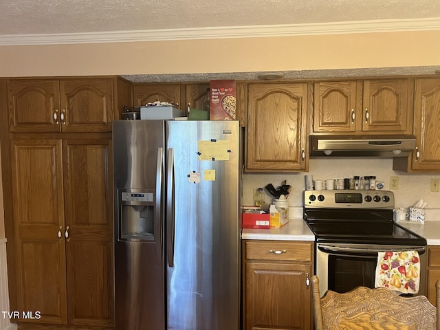 kitchen with stainless steel appliances and crown molding