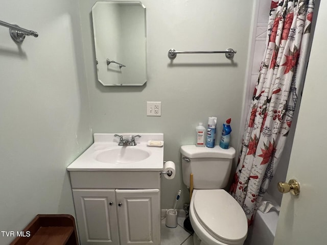 full bathroom with toilet, shower / bath combo, vanity, and tile patterned floors