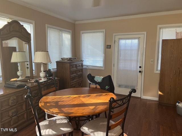 dining room with ornamental molding and dark wood-type flooring