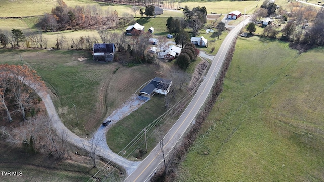 birds eye view of property featuring a rural view